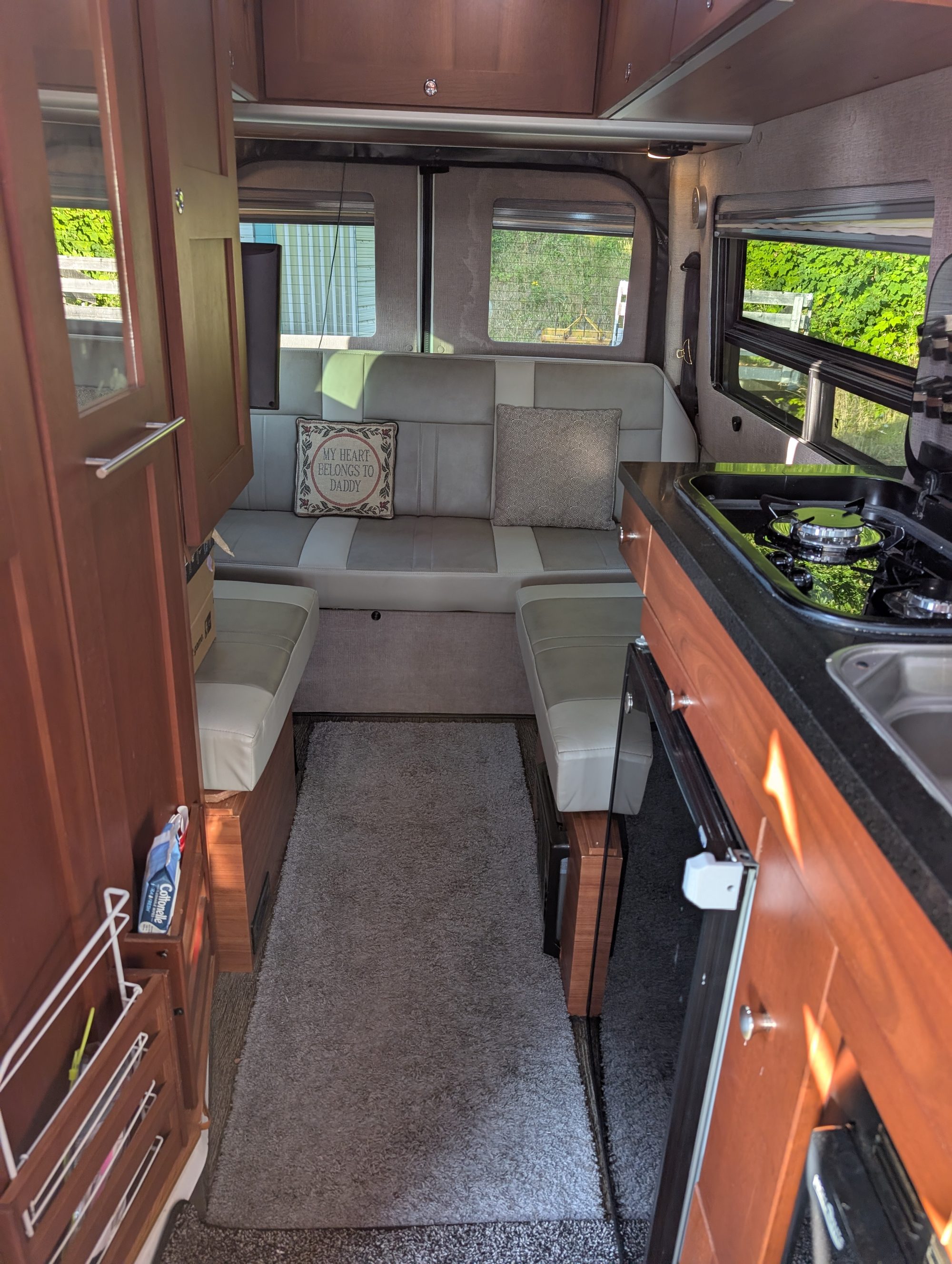 Rear lounge seating, converts to bed